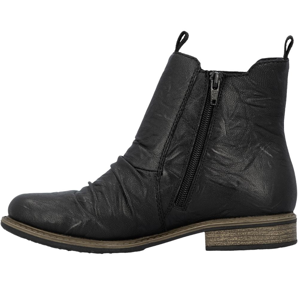 Black leather boot with a zipper on a white background