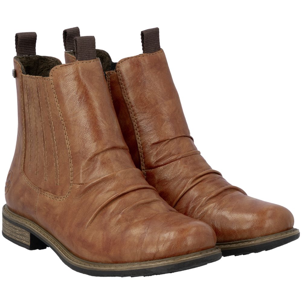 Pair of brown leather boots on a white background