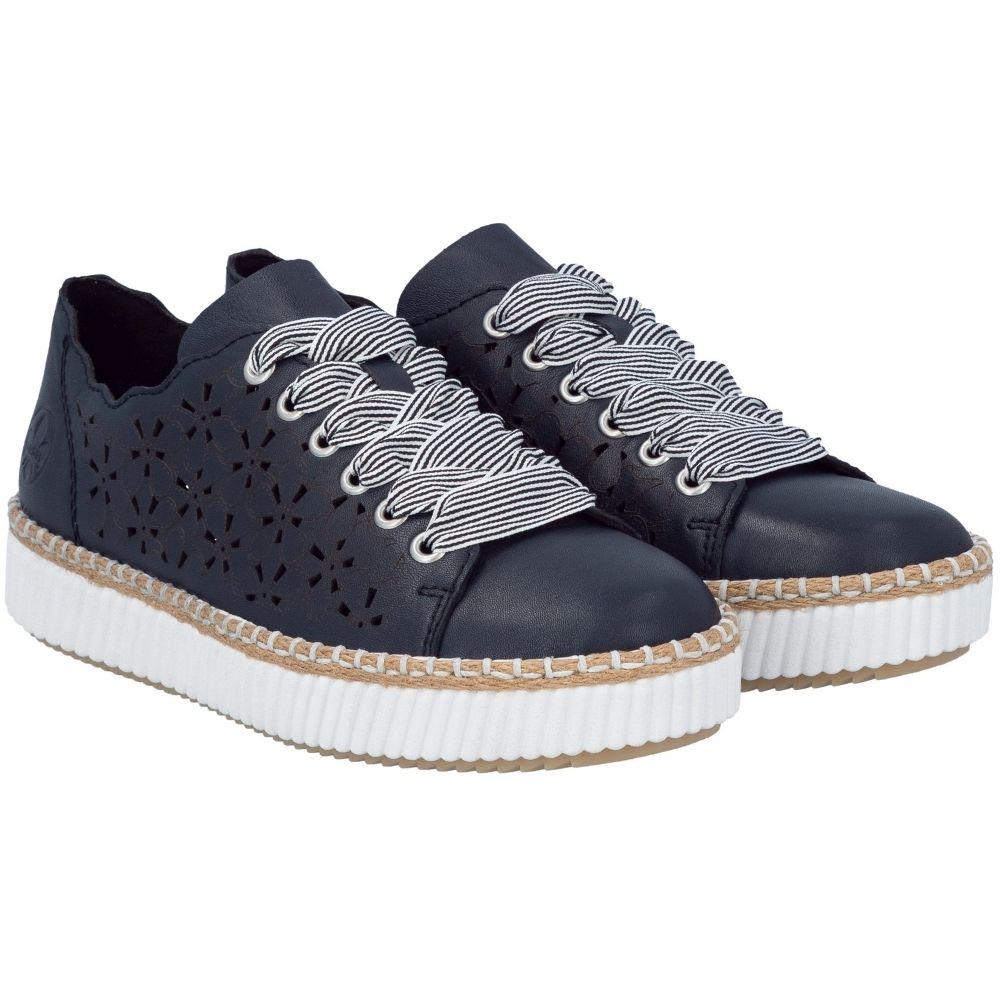 A pair of low-top platform sneakers in navy-blue leather with geometric laser-cutout details on the sides, featuring striped laces, a braided jute trim, and thick white ridged platform soles.