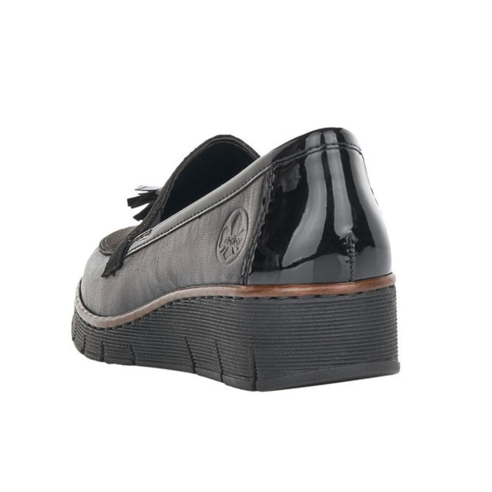 Black leather loafer with a platform sole on a white background