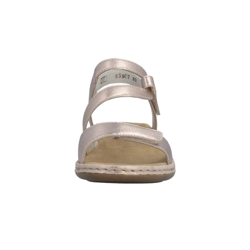 A single rose gold leather sandal shown from the front, with two adjustable Velcro straps against a plain white background.