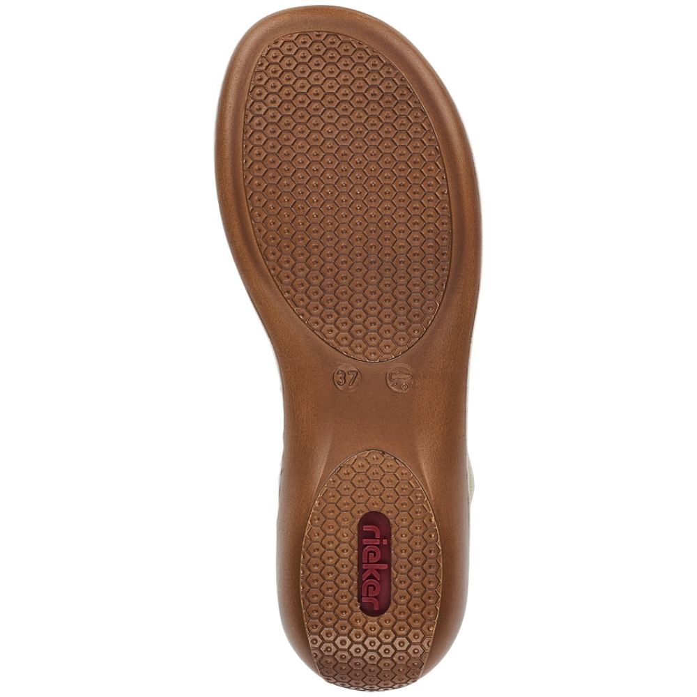 A top-down view of a brown shoe sole, showing a textured honeycomb pattern and a red 'Rieker' logo on the heel, isolated on a white background.