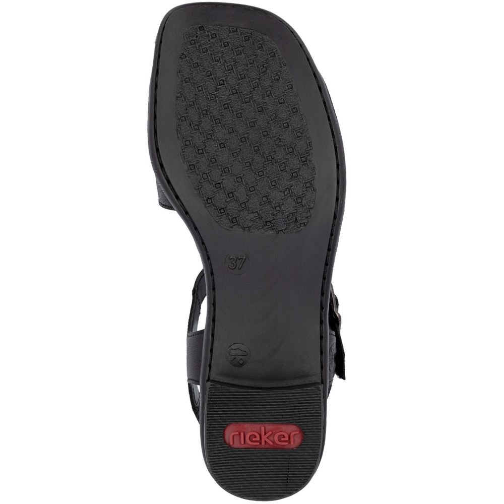 Black sandal sole with a textured grip pattern and a red 'Rieker' logo on the heel, shown against a white background.