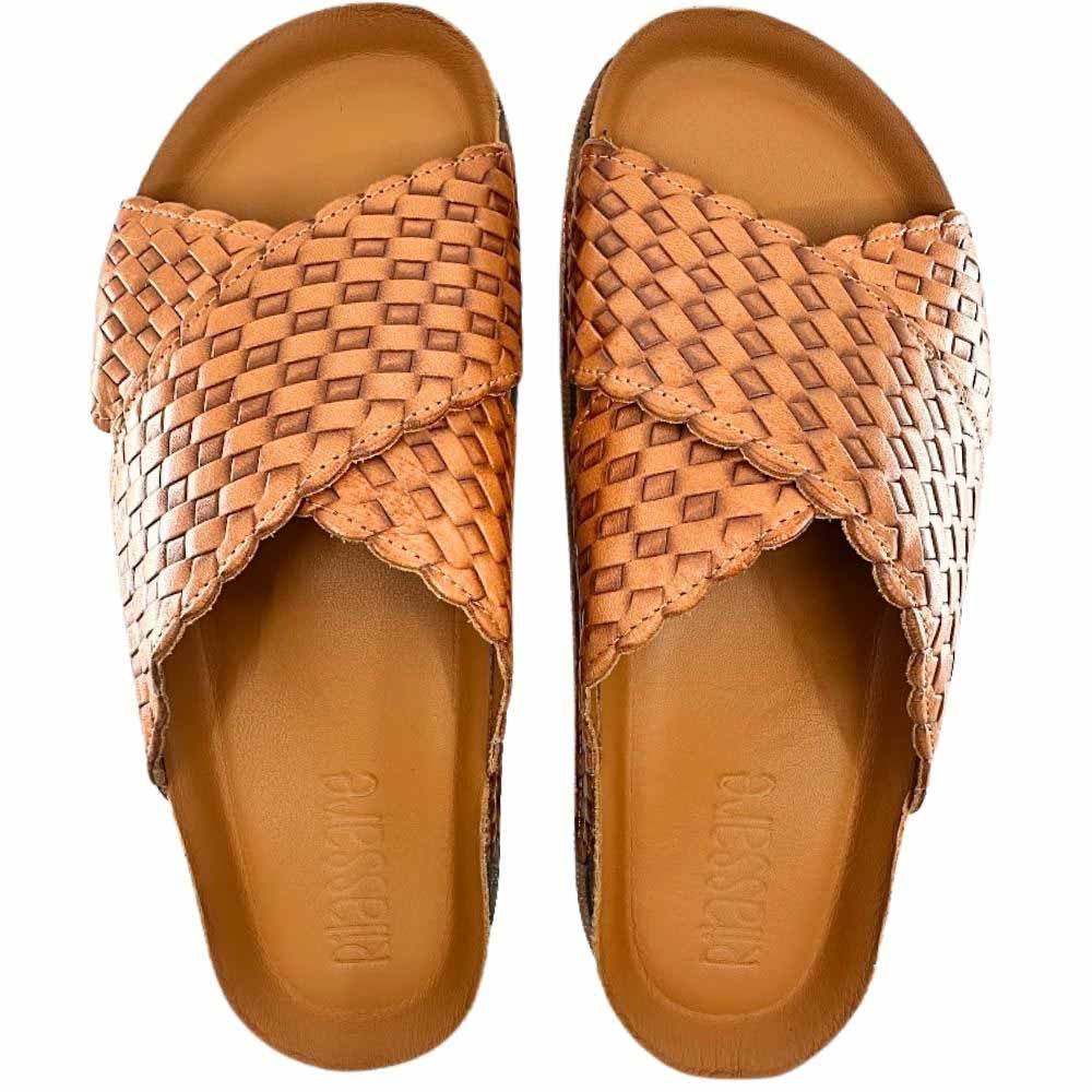 A pair of tan woven leather slide sandals with scalloped edges and a contoured footbed, shown from a top-down view on a white background. The brand name 'Rilassare' is embossed on the footbed.