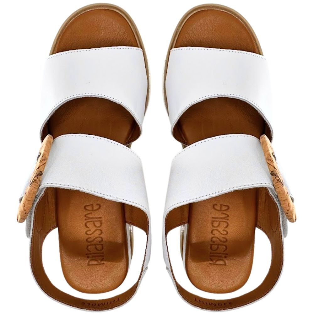 A pair of white leather wedge sandals with a brown footbed, shown from a top-down view on a white background.
