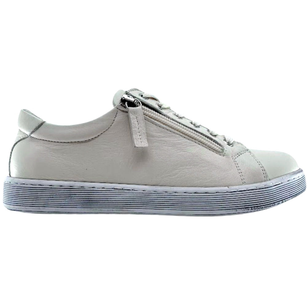 Cream sneaker with a strap on a white background