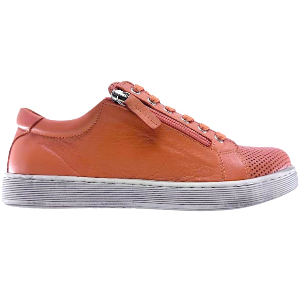 Orange sneaker with a white sole on a white background
