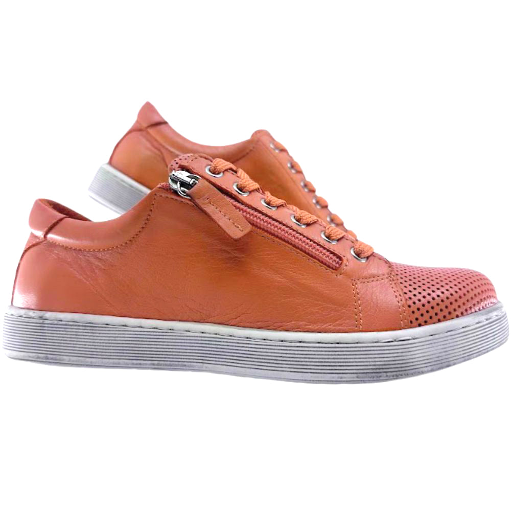 Pair of orange sneakers on a white background