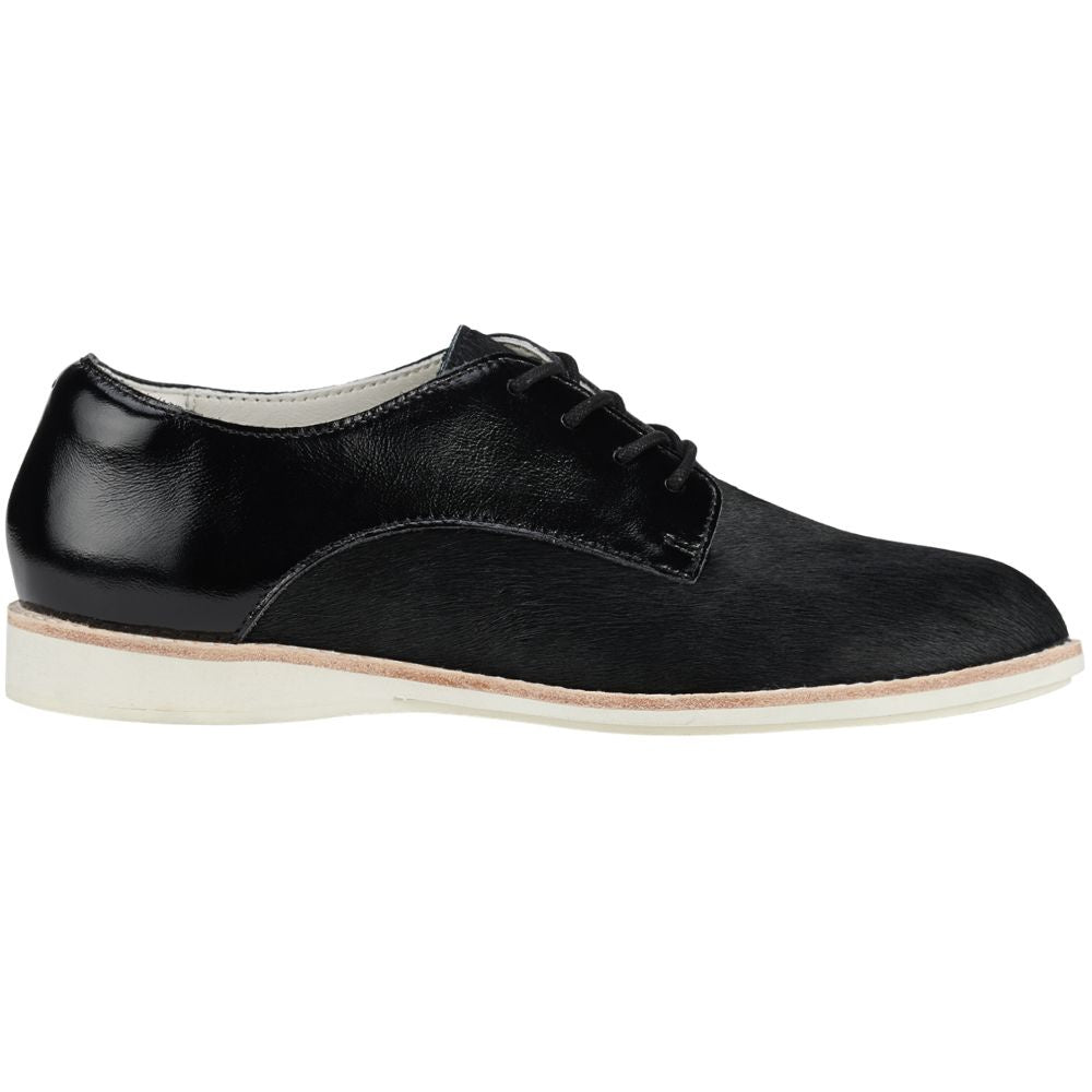 Black patent and pony leather shoe with black laces on a white background