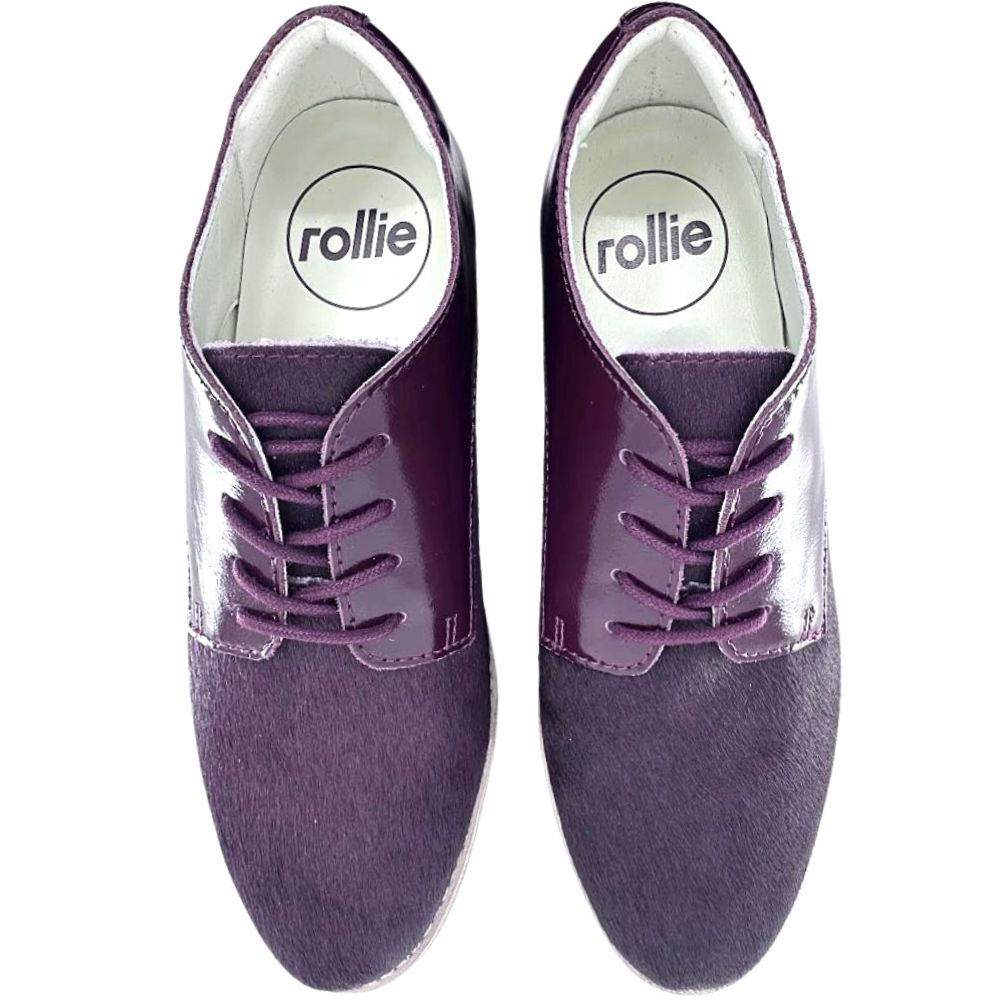 Cherry pony leather shoes with 'rollie' branding on a white background