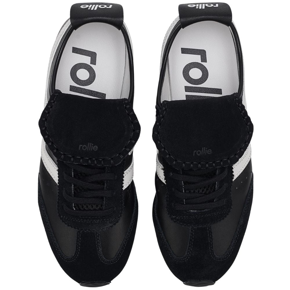 Black sneakers with white stripes on a white background