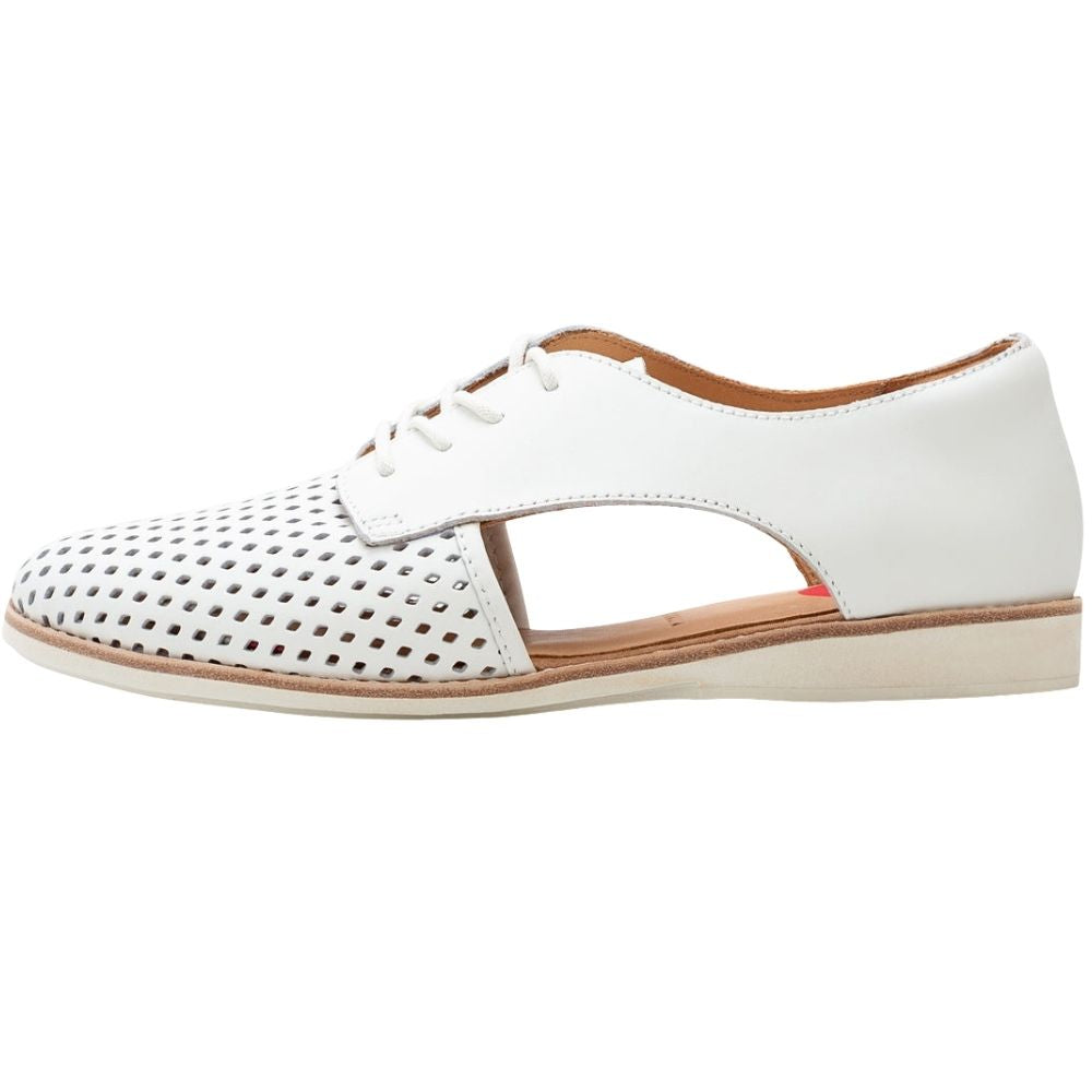 A white leather lace-up shoe with perforated detailing on the toe box and a cutout design on the side, shown in profile against a white background.
