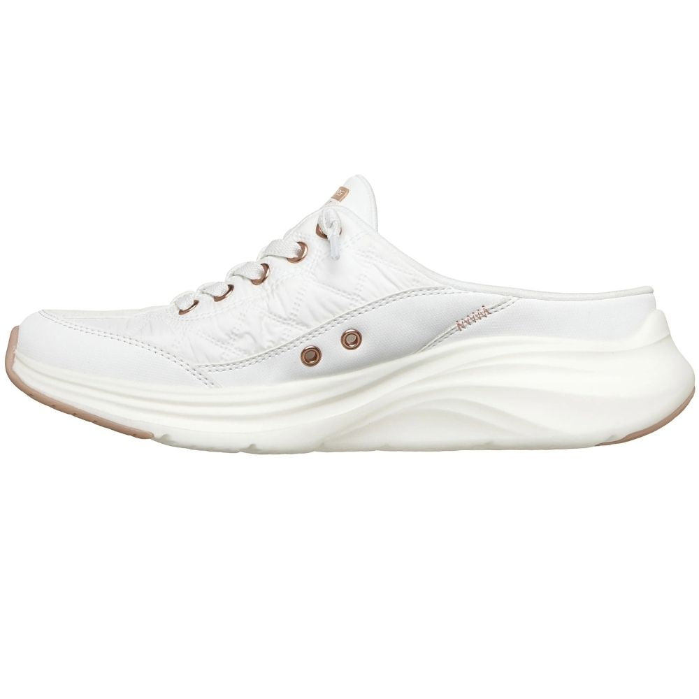 A white slip-on mule sneaker by SKECHERS featuring rose gold metallic details and a white sole, against a white background.