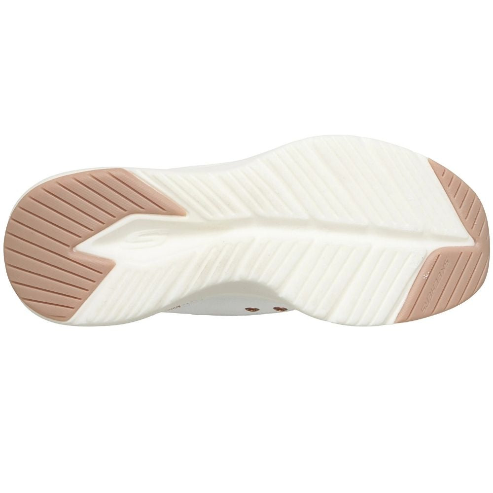 A white and brown rubber shoe outsole with a tread pattern, shown against a white background.