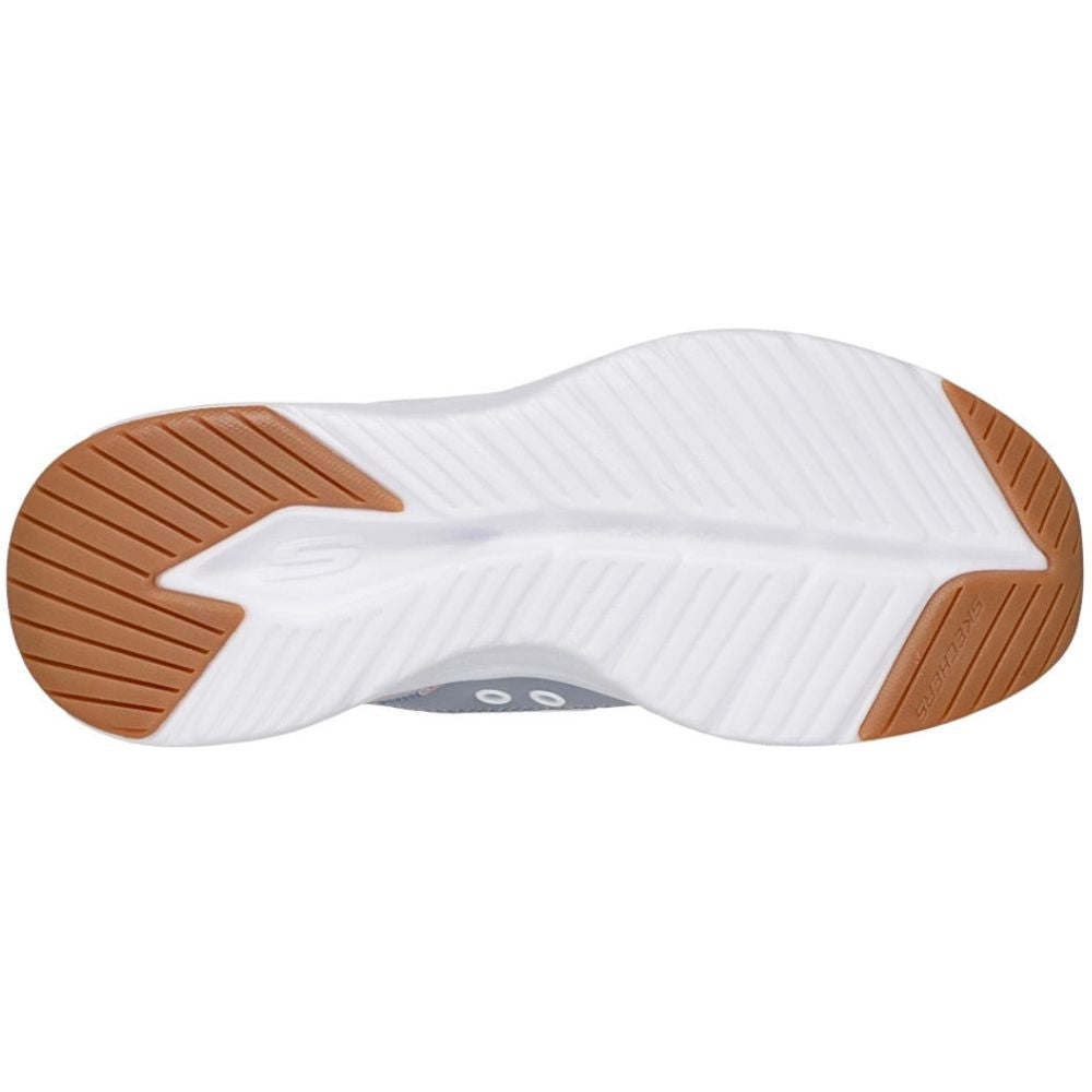 The bottom sole of a athletic shoe, featuring a white textured midsole and a brown rubber outsole with grooved tread patterns.
