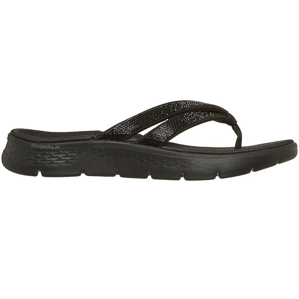 A single black flip-flop sandal with metallic black rhinestone embellished straps, shown in a side profile on a white background. The text 'GOWALK' is visible on the heel of the sole.