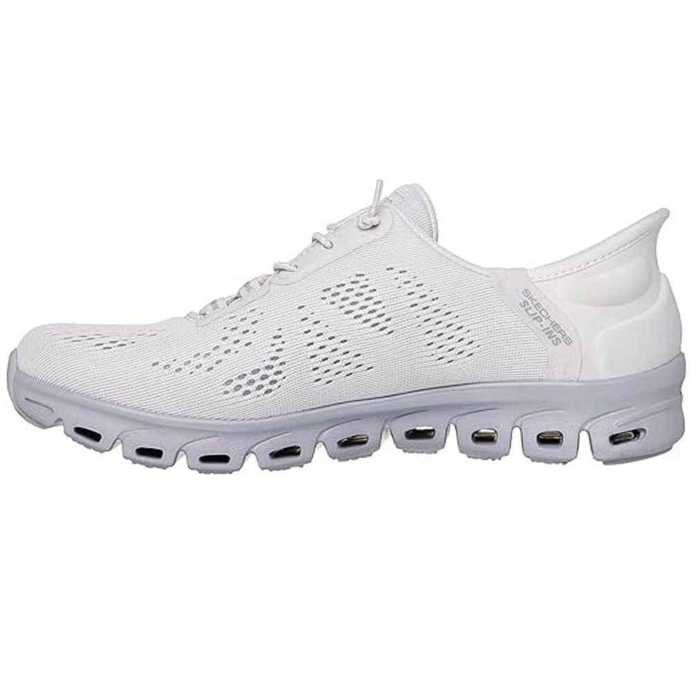 White shoe with flexible lavender sole with visible Skechers brand logo on a white background