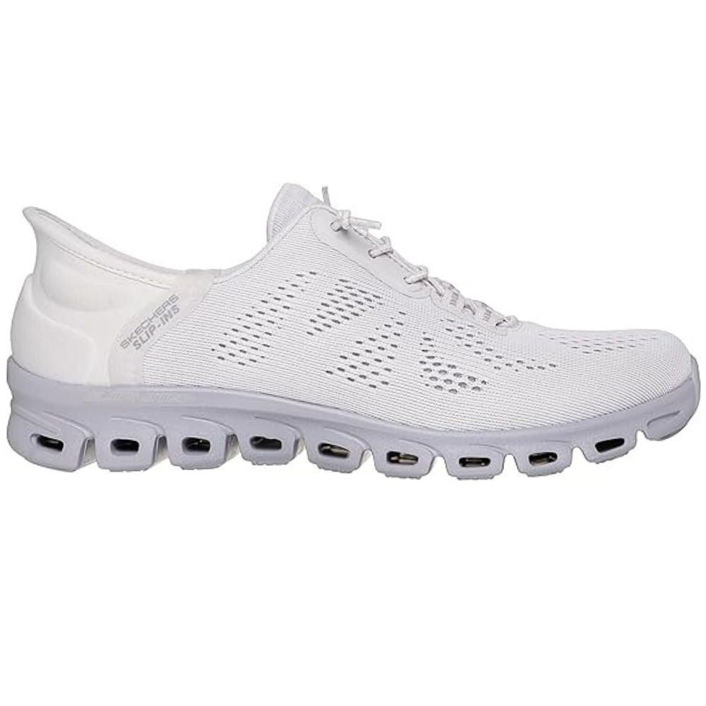 White shoe with flexible lavender sole with visible Skechers brand logo on a white background