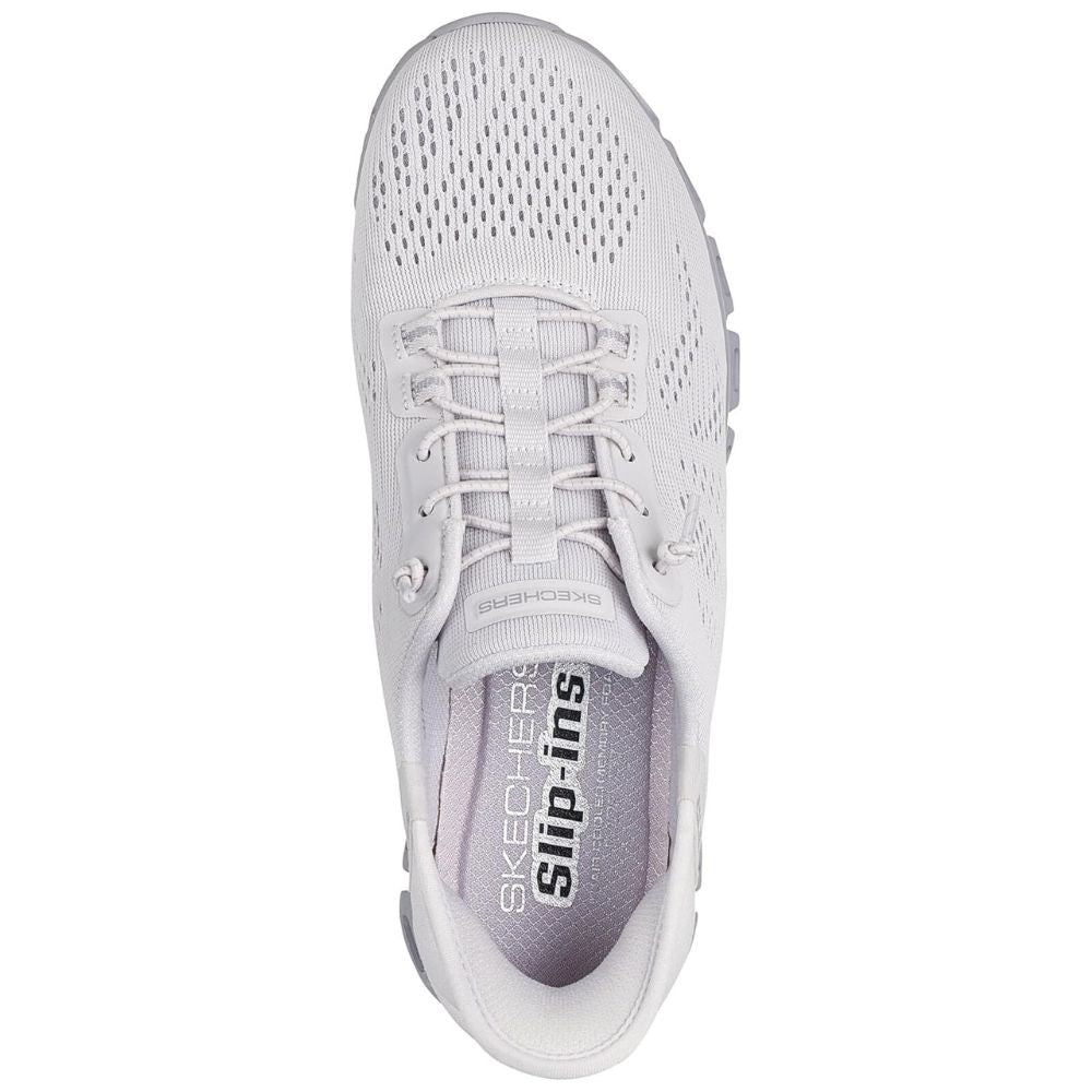 White sneaker with 'Skechers' branding on a white background