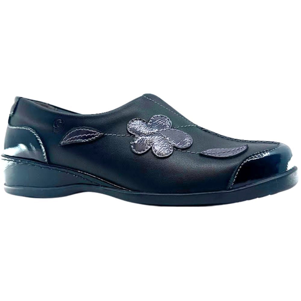 Black shoe with floral design on a white background