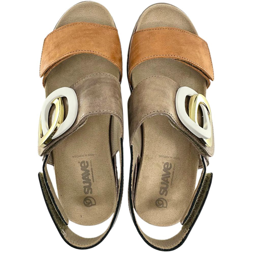 A pair of women's platform sandals by Suave, featuring tan and brown leather straps, and a chunky white platform buckle with gold-toned detailing, shown from a top-down view on a white background.