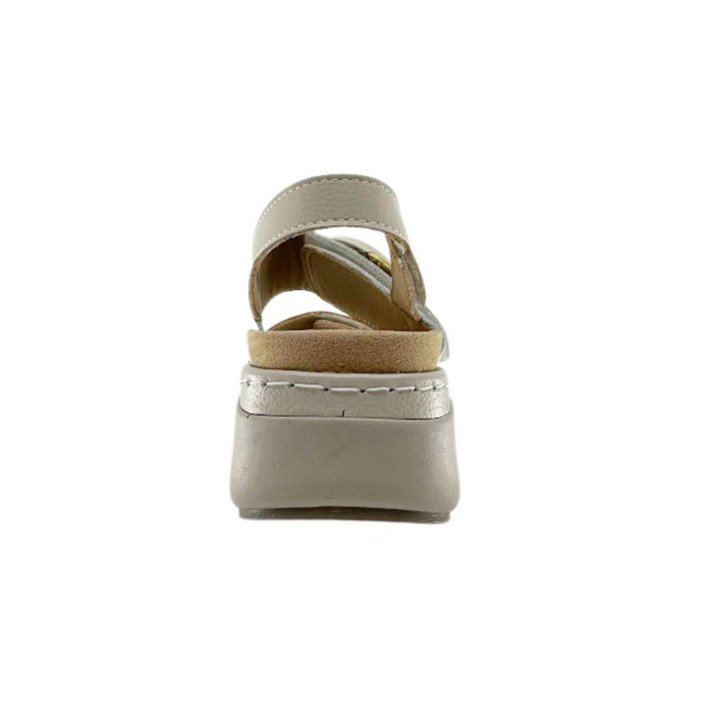 A single women's platform sandal shown from the back, featuring a beige leather strap, a tan suede-like midsole, and a thick beige platform sole with white contrast stitching.