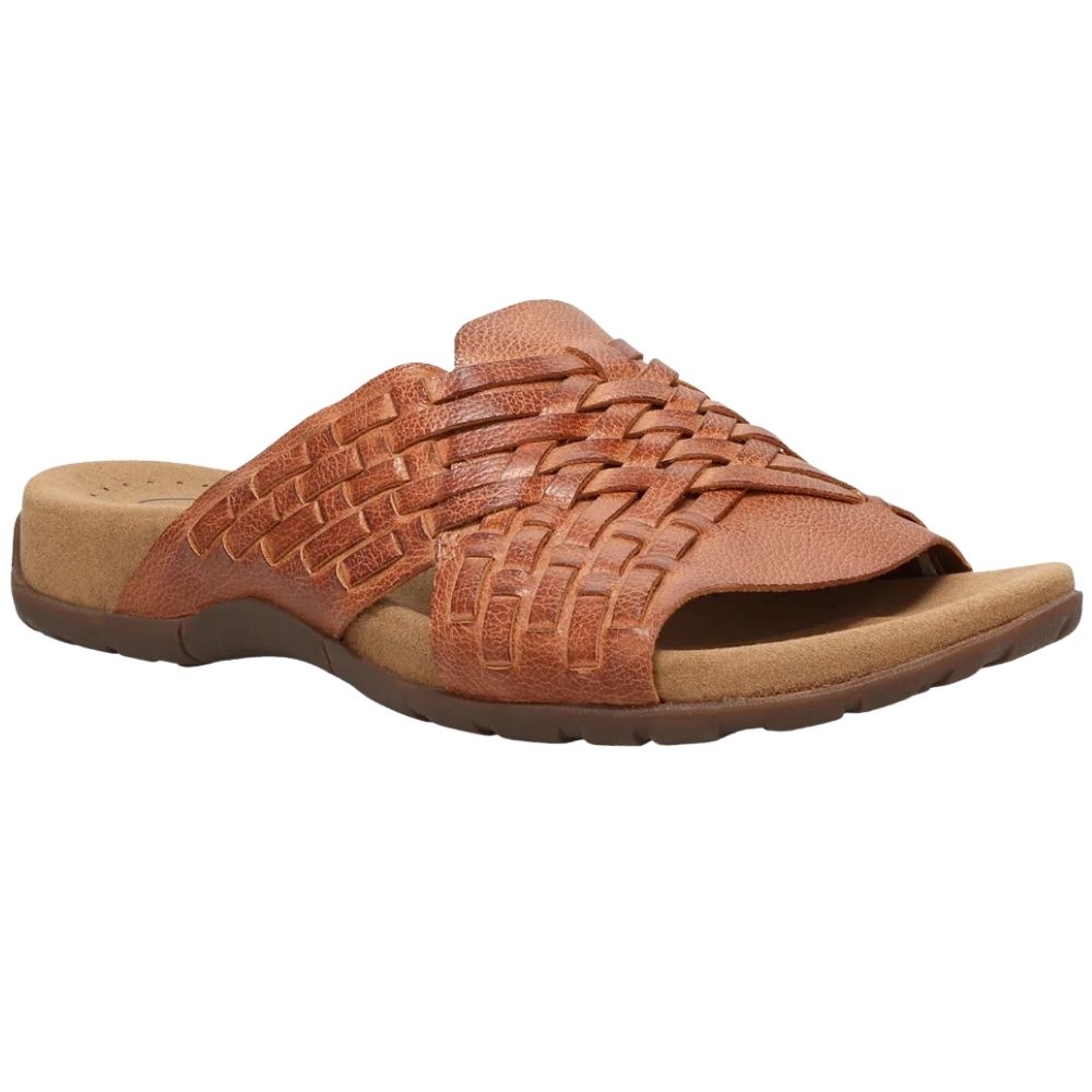 A single tan leather slide sandal with a woven upper, a contoured brown footbed, and a contoured midsole on a plain white background.