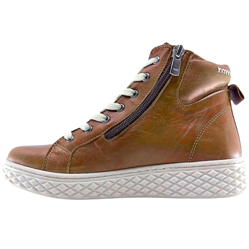 Tan leather ankle boot with white sole on a white background