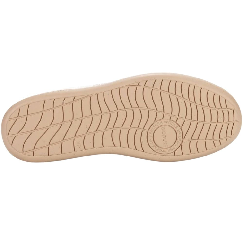 Beige sole of a shoe on a white background