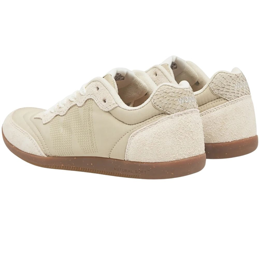A pair of low-top sneakers in recycled ivory textiles with brown gum soles, shown from a three-quarters angle on a white background.