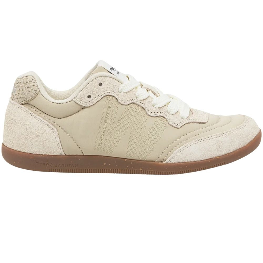 A low-top sneaker in ivory recycled textile with white laces and a brown gum sole, shown in a side profile on a white background.