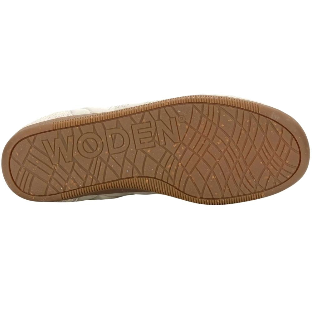 The outsole of a Woden shoe, showing a brown textured rubber tread with the brand name 'WODEN' embossed in large letters, on a white background.