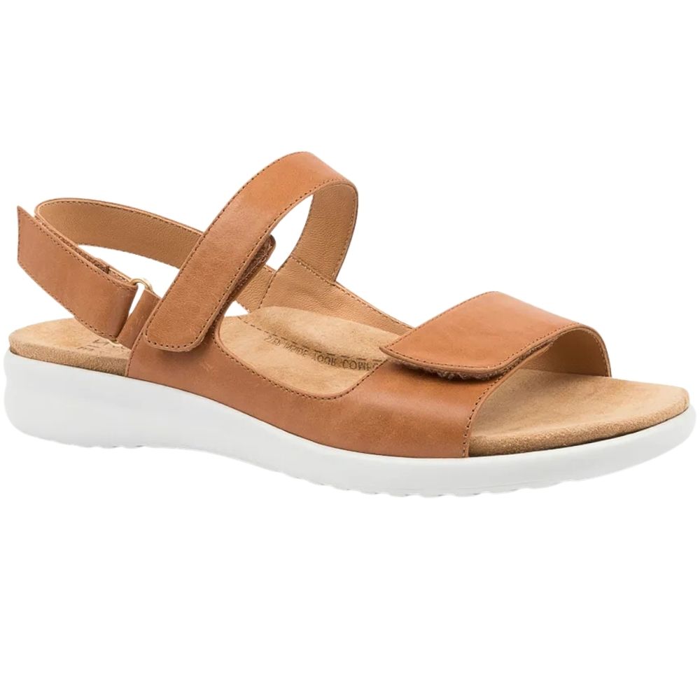 A tan leather three-strap ZIERA sandal with a white wedge sole, shown from a side profile on a white background.