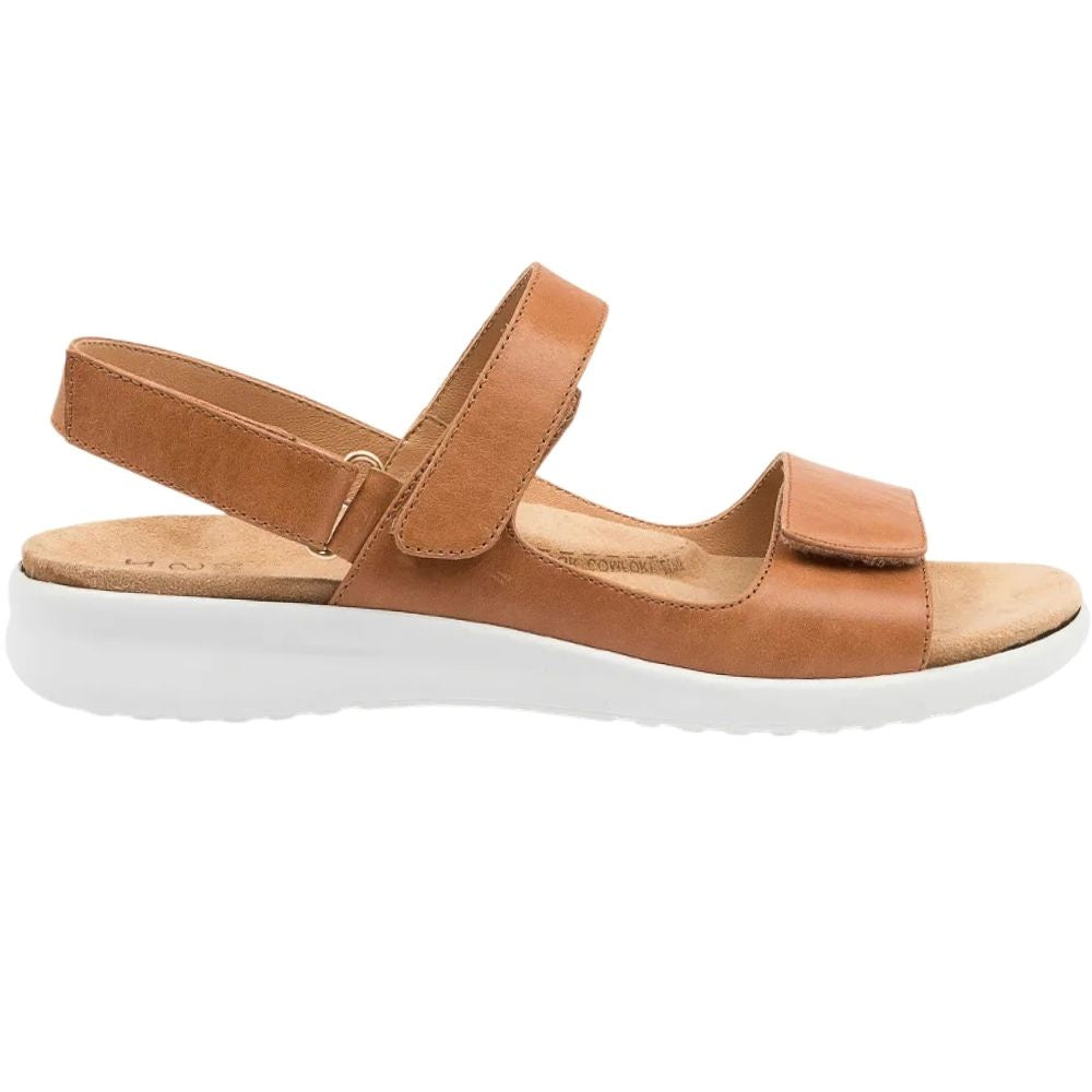 A tan leather ZIERA sandal with a thick white platform sole, shown in a side profile view against a plain white background.