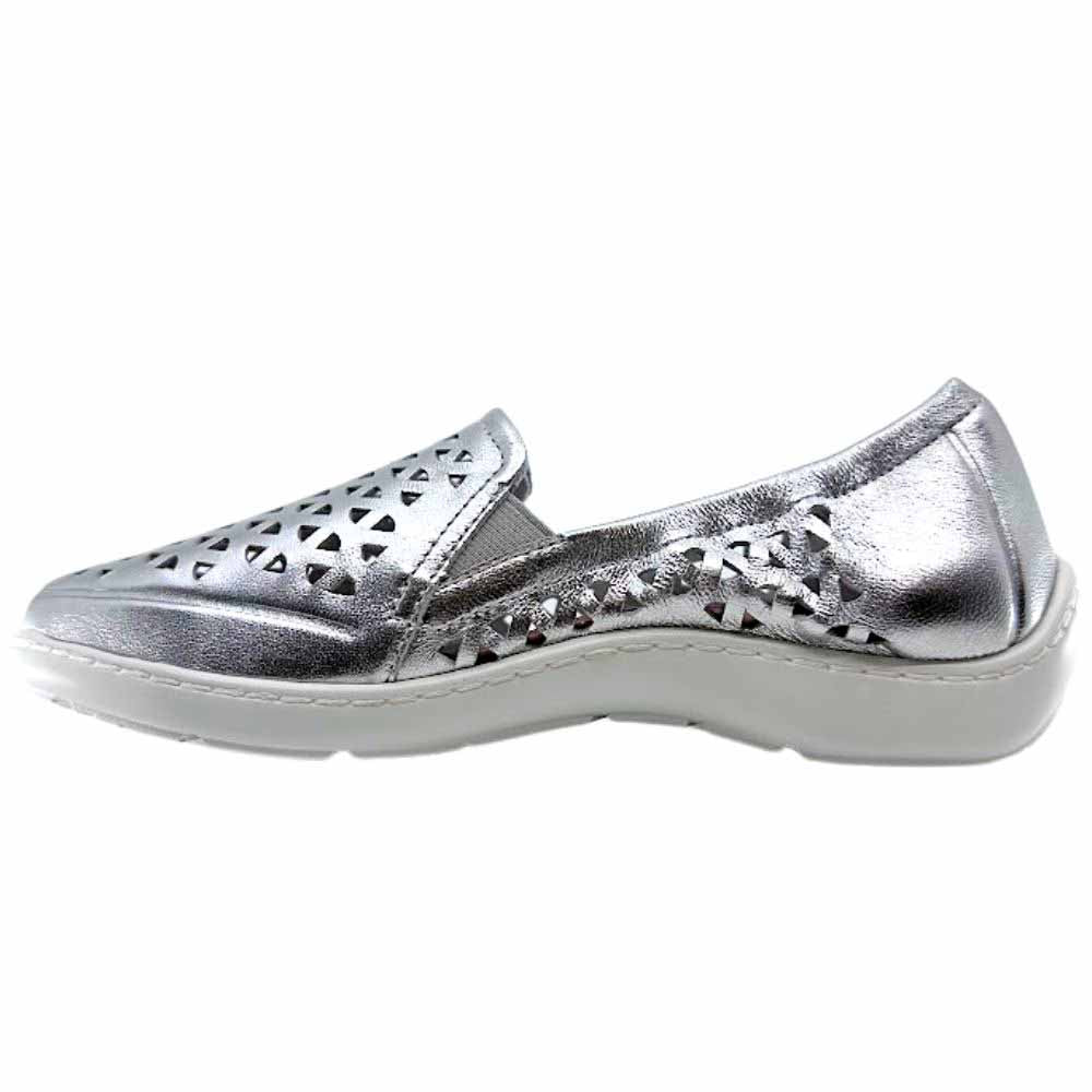 A metallic silver slip-on shoe with geometric laser-cut patterns on the toe and side, featuring a white sole, shown against a plain white background.